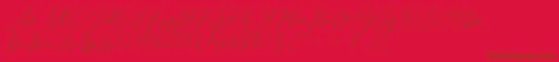 Fonte Romtthing Free – fontes marrons em um fundo vermelho