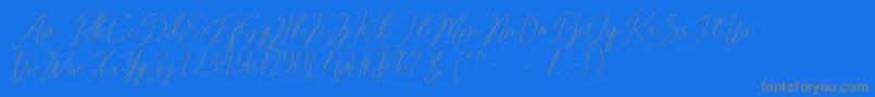 Romtthing Free-Schriftart – Graue Schriften auf blauem Hintergrund