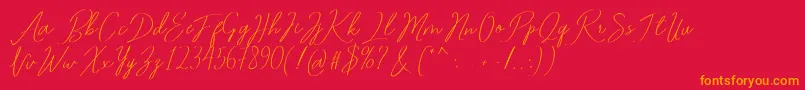 フォントRomtthing Free – 赤い背景にオレンジの文字