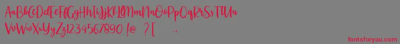 Romullus Demo Font – Red Fonts on Gray Background