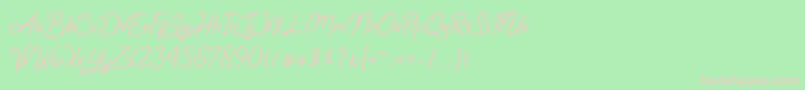 Romy  Jules-fontti – vaaleanpunaiset fontit vihreällä taustalla