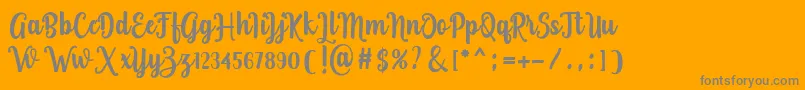 Rosalinda-Schriftart – Graue Schriften auf orangefarbenem Hintergrund