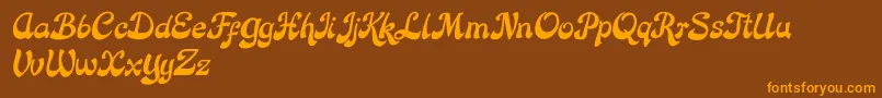 フォントRose Katrinah Italic – オレンジ色の文字が茶色の背景にあります。