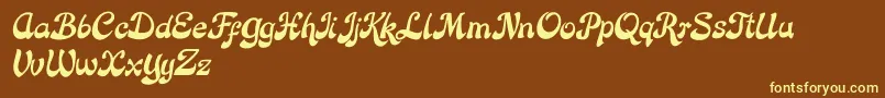 Rose Katrinah Italic-fontti – keltaiset fontit ruskealla taustalla