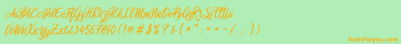 Rosedita freedemo-Schriftart – Orangefarbene Schriften auf grünem Hintergrund