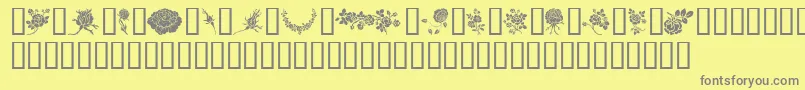 Rosegarden-fontti – harmaat kirjasimet keltaisella taustalla