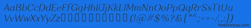 Шрифт Rossanova LightItalic – чёрные шрифты на синем фоне