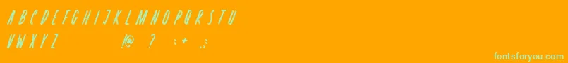 Czcionka Rosterica – zielone czcionki na pomarańczowym tle