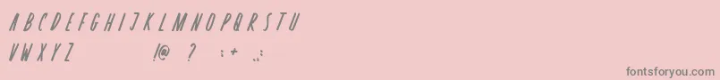 フォントRosterica – ピンクの背景に灰色の文字