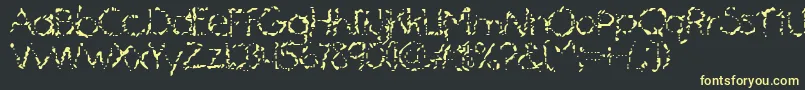 MascaraMistake Font – Yellow Fonts on Black Background