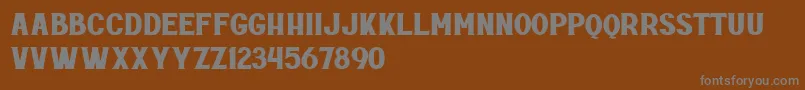 Rottely Free Personal Use Font – Gray Fonts on Brown Background