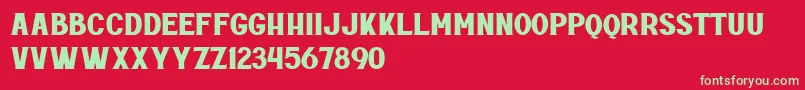 Czcionka Rottely Free Personal Use – zielone czcionki na czerwonym tle