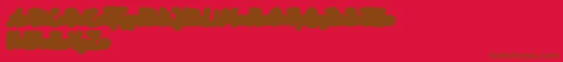 Rotterin Extrude Demo-Schriftart – Braune Schriften auf rotem Hintergrund