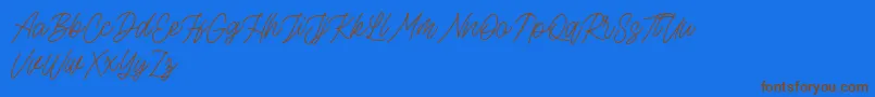 Lisätietoja Rottordam Thin FREE-fontista Rottordam Thin FREE-fontti – ruskeat fontit sinisellä taustalla