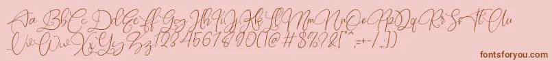 Rottrydam Wargna Personal Use-Schriftart – Braune Schriften auf rosa Hintergrund