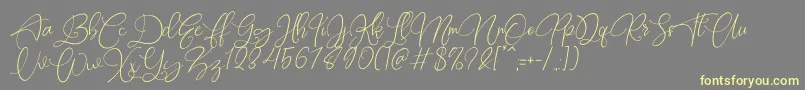 Rottrydam Wargna Personal Use-Schriftart – Gelbe Schriften auf grauem Hintergrund