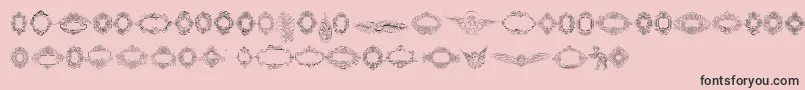 Fonte Rough Calligraphic Frames – fontes pretas em um fundo rosa