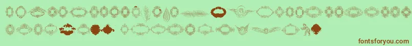 Шрифт Rough Calligraphic Frames – коричневые шрифты на зелёном фоне