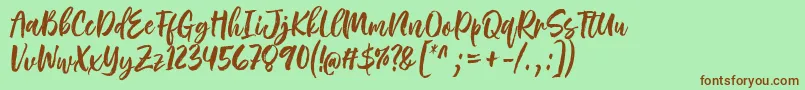 フォントRough Rough Font by 7NTypes – 緑の背景に茶色のフォント