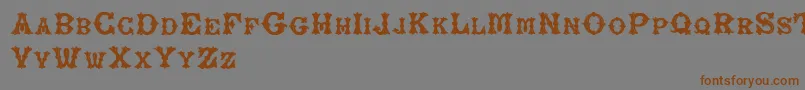 RoughTuscan-Schriftart – Braune Schriften auf grauem Hintergrund
