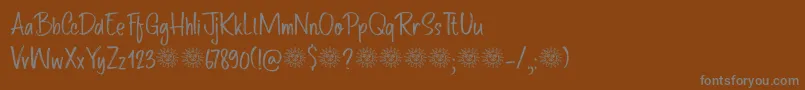 フォントRoute Du Soleil DEMO – 茶色の背景に灰色の文字