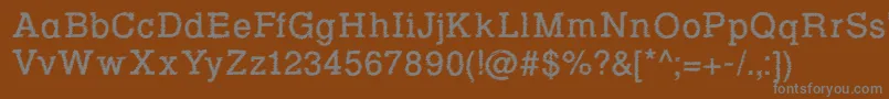 フォントRowdy Typemachine 1   Regular – 茶色の背景に灰色の文字