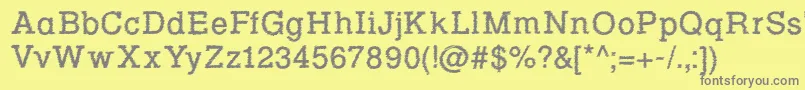fuente Rowdy Typemachine 1   Regular – Fuentes Grises Sobre Fondo Amarillo