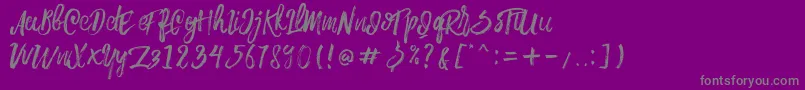 Rowo Typeface -fontti – harmaat kirjasimet violetilla taustalla