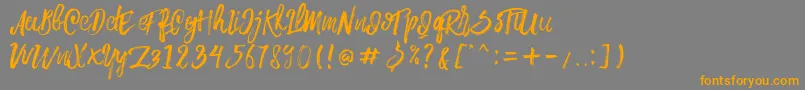 Weitere Informationen zur Rowo Typeface -Schriftart Rowo Typeface -Schriftart – Orangefarbene Schriften auf grauem Hintergrund