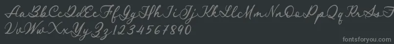 Royal Stamford demo-fontti – harmaat kirjasimet mustalla taustalla