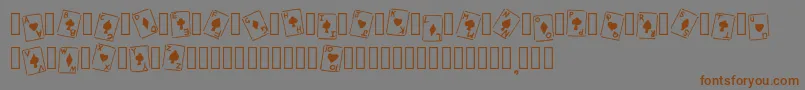 RoyalFlush Basic Regular Font – Brown Fonts on Gray Background