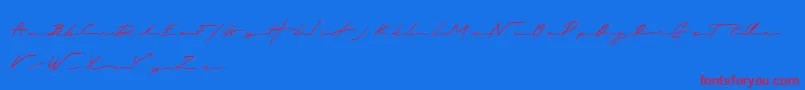 Royalia Font – Red Fonts on Blue Background