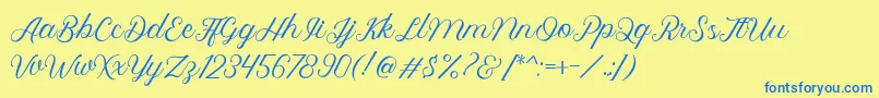 フォントRoyalite Script – 青い文字が黄色の背景にあります。