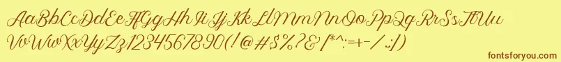 fuente Royalite Script – Fuentes Marrones Sobre Fondo Amarillo