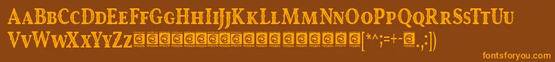 フォントRoyalKing Free – オレンジ色の文字が茶色の背景にあります。