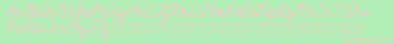 Royalman-fontti – vaaleanpunaiset fontit vihreällä taustalla