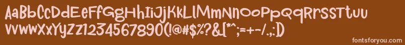 Czcionka Royum Bread Font by 7NTypes – różowe czcionki na brązowym tle