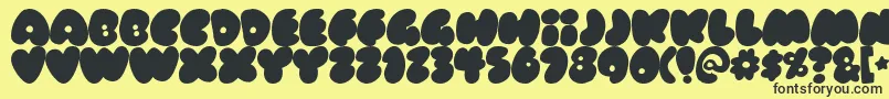 Fonte RUBBERNECK – fontes pretas em um fundo amarelo