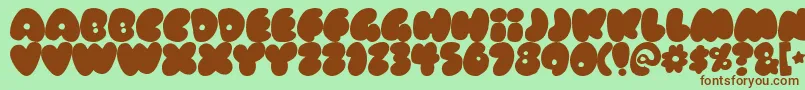 RUBBERNECK Font – Brown Fonts on Green Background