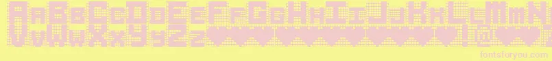 フォントRUBIKS CUBE – ピンクのフォント、黄色の背景