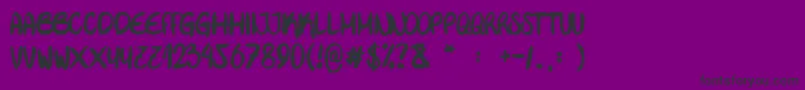 フォントRue Mademoiselle – 紫の背景に黒い文字