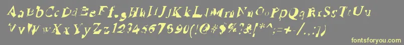 RuinedSerifIta-Schriftart – Gelbe Schriften auf grauem Hintergrund