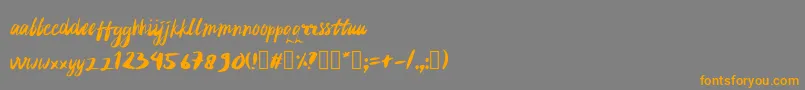 rujakpetis Font – Orange Fonts on Gray Background