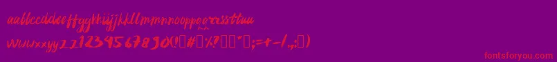 フォントrujakpetis – 紫の背景に赤い文字
