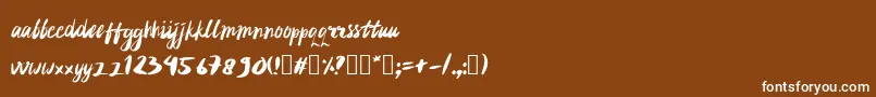 フォントrujakpetis – 茶色の背景に白い文字