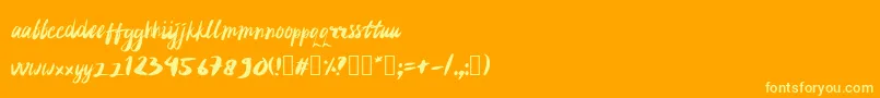 フォントrujakpetis – オレンジの背景に黄色の文字