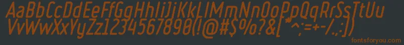 Ruler Bold Italic-fontti – ruskeat fontit mustalla taustalla