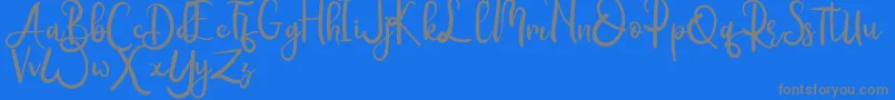 Rumero-Schriftart – Graue Schriften auf blauem Hintergrund