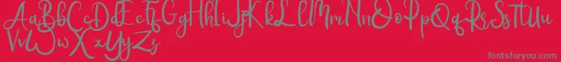 Rumero Font – Gray Fonts on Red Background