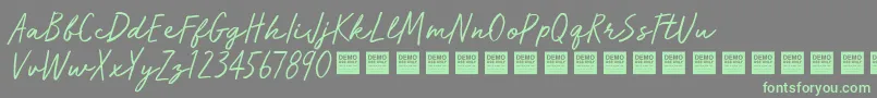 フォントRun Wild   Demo – 灰色の背景に緑のフォント
